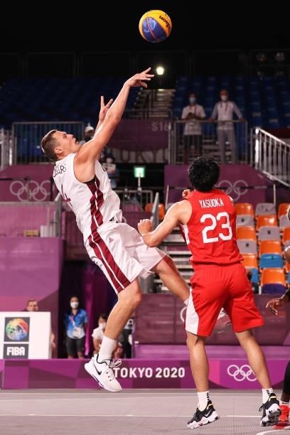 Agnis Cavars of Team Latvia shoots during the Men's Pool Round match between Latvia and Japan on day two of the Tokyo 2020 Olympic Games at Aomi...