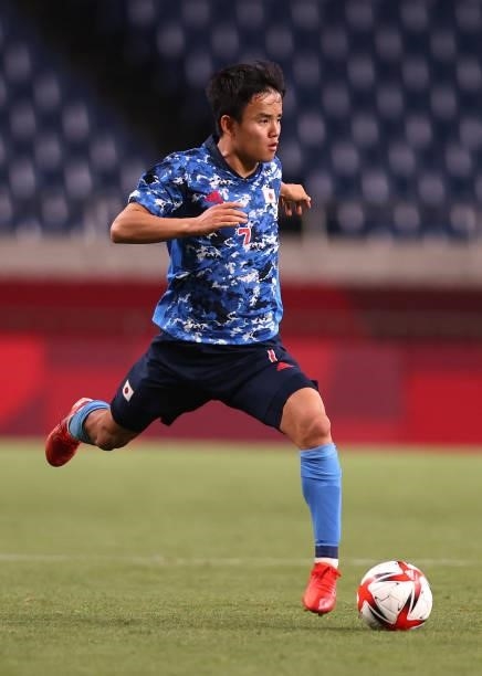 Takefusa Kubo of Team Japan runs with the ball during the Men's First Round Group A match between Japan and Mexico on day two of the Tokyo 2020...