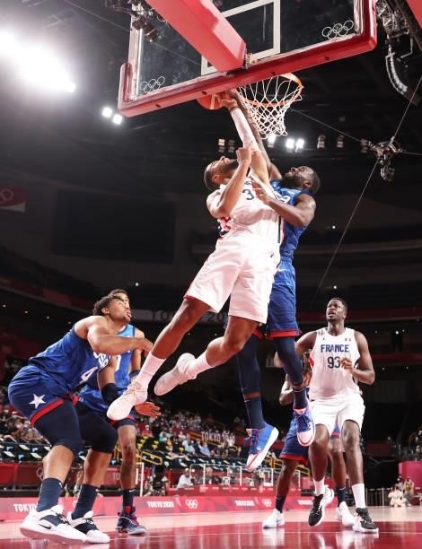 Timothe Luwawu Kongbo of Team France has his attempt at a dunk blocked by Draymond Green of Team United States during the second half of the Men's...