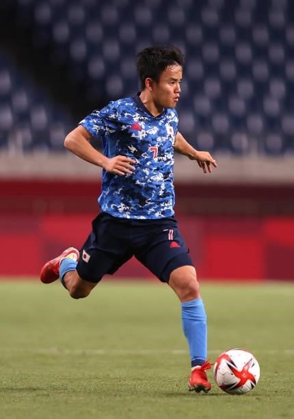Takefusa Kubo of Team Japan runs with the ball during the Men's First Round Group A match between Japan and Mexico on day two of the Tokyo 2020...