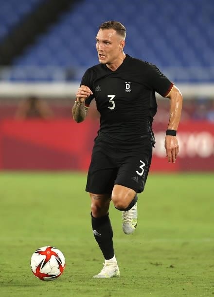 David Raum of Team Germany runs with the ball during the Men's First Round Group D match between Saudi Arabia and Germany on day two of the Tokyo...