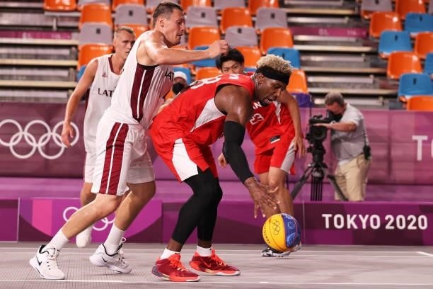 Ira Brown of Team Japan controls the ball during the Men's Pool Round match between Latvia and Japan on day two of the Tokyo 2020 Olympic Games at...