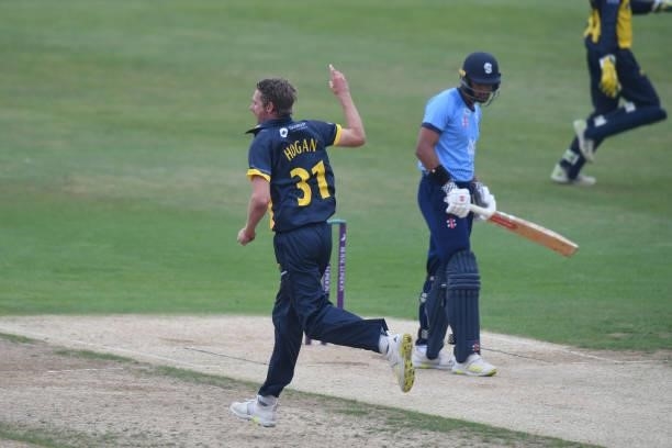 Michael Hogan of Glamorgan celebrates taking the wicket of Emilio Gay of Northamptonshire during the Royal London Cup match between Northamptonshire...