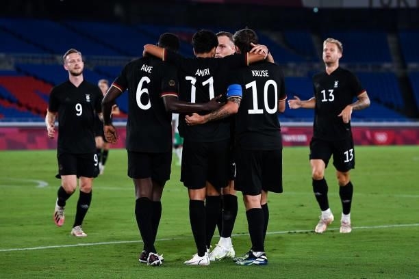 Nadiem Amiri of Germany celebrates with Ragnar Ache of Germany and Max Kruse of Germany after scoring his sides first goal during the Tokyo 2020...
