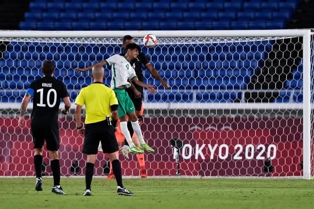 Abdulbasit Al Hindi of Saudi Arabia competes for the headed ball with Felix Uduokhai of Germany during the Tokyo 2020 Olympic Mens Football...