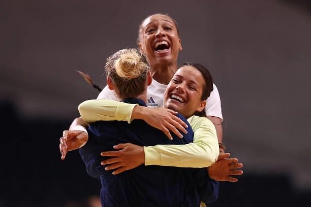 Amandine Leynaud, Cleopatre Darleux and Beatrice Edwige of Team France celebrate together after winning Women's Preliminary Round Group B match...