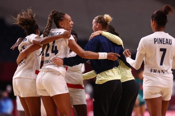 Beatrice Edwige of Team France celebrates with teammates after winning Women's Preliminary Round Group B match between Hungary and France on day two...