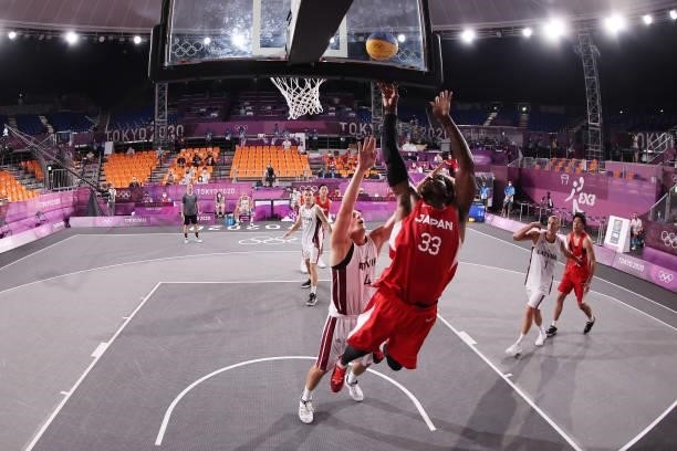 Ira Brown of Team Japan drives to the basket during the Men's Pool Round match between Latvia and Japan on day two of the Tokyo 2020 Olympic Games at...