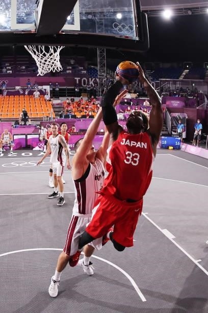 Ira Brown of Team Japan drives to the basket during the Men's Pool Round match between Latvia and Japan on day two of the Tokyo 2020 Olympic Games at...