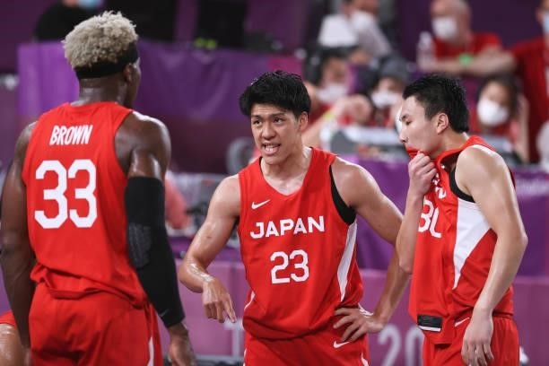 Ryuto Yasuoka of Team Japan talks to team mates in a huddle during the Men's Pool Round match between Latvia and Japan on day two of the Tokyo 2020...