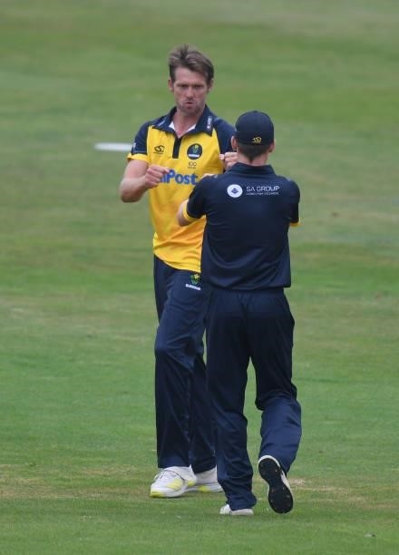 Michael Hogan of Glamorgan celebrates taking the wicket of Rob Keogh of Northamptonshire during the Royal London Cup match between Northamptonshire...