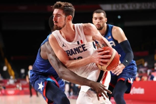 Nando de Colo of Team France drives to the basket against Team United States of America during the second half of the Men's Preliminary Round Group B...