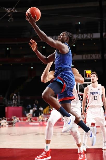 Jrue Holiday of Team United States drives to the basket against Team France during the second half of the Men's Preliminary Round Group B game on day...