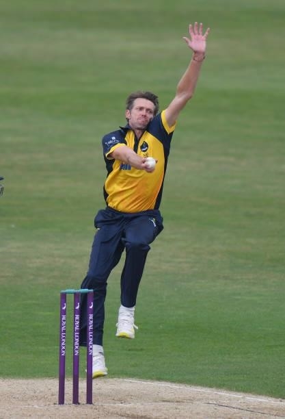 Michael Hogan of Glamorgan bowls during the Royal London Cup match between Northamptonshire and Glamorgan at The County Ground on July 25, 2021 in...