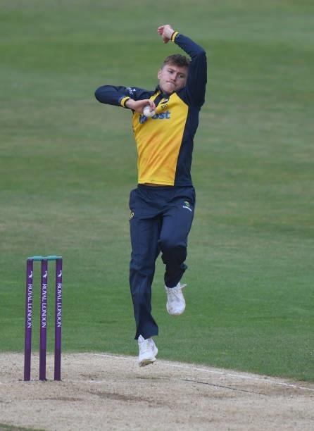 Callum Taylor of Glamorgan bowls during the Royal London Cup match between Northamptonshire and Glamorgan at The County Ground on July 25, 2021 in...