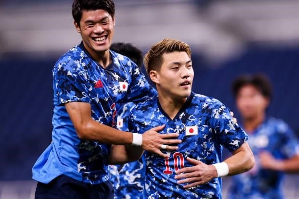 Doan Ritsu of Japan celebrates his scoring during the Men's First Round Group A match between Japan and Mexico on day two of the Tokyo 2020 Olympic...