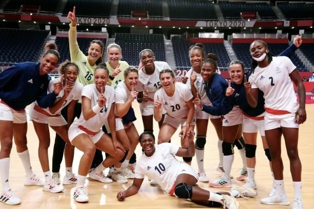 Players of France celebrate their victory after the match between France and Hungary on day two of the Tokyo 2020 Olympic Games at Yoyogi National...