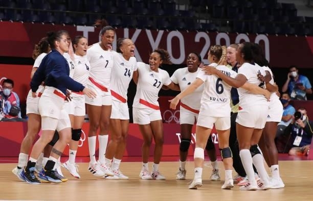 Players of France celebrate their victory after the match between France and Hungary on day two of the Tokyo 2020 Olympic Games at Yoyogi National...