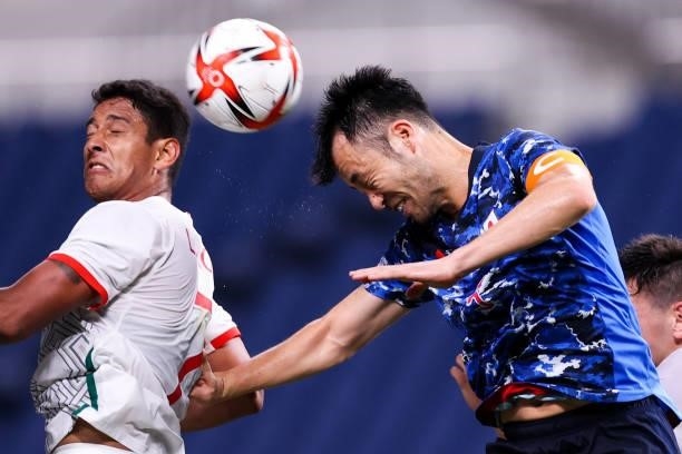 Yoshida Maya Japan competes for the ball during the Men's First Round Group A match between Japan and Mexico on day two of the Tokyo 2020 Olympic...