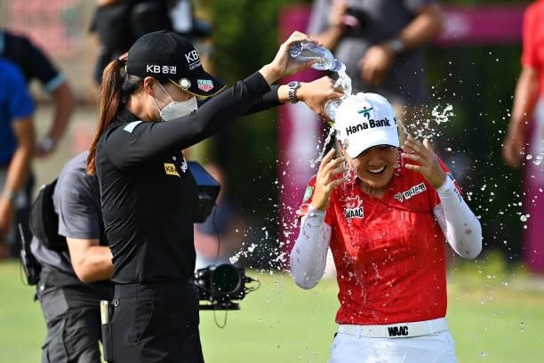 Tournament winner Minjee Lee of Australia celebrates on the eighteenth green during day four of the The Amundi Evian Championship at Evian Resort...