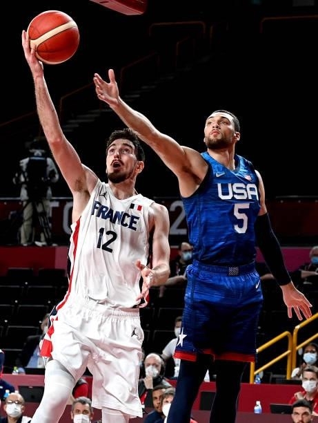 Nando de Colo of France drives to the basket during the preliminary rounds of the Men's Basketball match between the USA and France on day two of the...