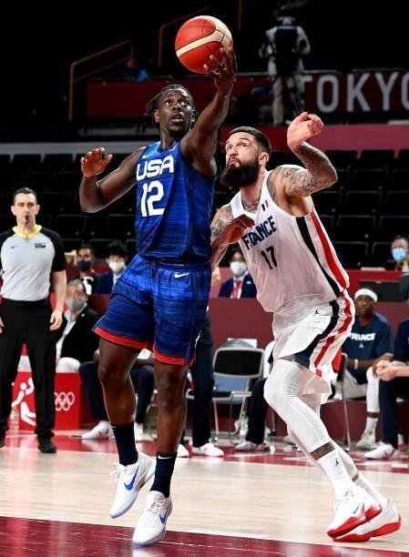Jrue Holiday of the USA drives to the basket during the preliminary rounds of the Men's Basketball match between the USA and France on day two of the...