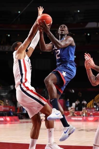 Jrue Holiday of Team United States drives to the basket against Team France during the first half of the Men's Preliminary Round Group B game on day...