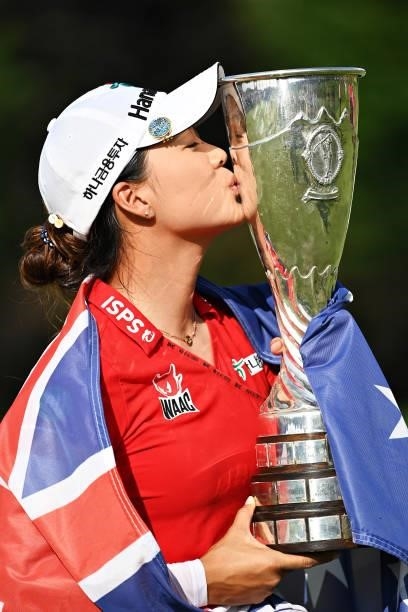 Tournament winner Minjee Lee of Australia celebrates with her trophy during day four of the The Amundi Evian Championship at Evian Resort Golf Club...