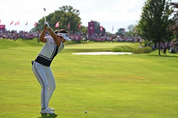 Jeongeun Lee6 of South Korea plays her approach shot on the playoff hole on the eighteenth hole during day four of the The Amundi Evian Championship...