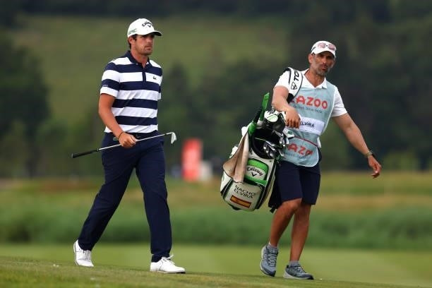 Nacho Elvira of Spain walks with caddy down the 12th hole during Day Four of the Cazoo Open supported by Gareth Bale at Celtic Manor Resort on July...