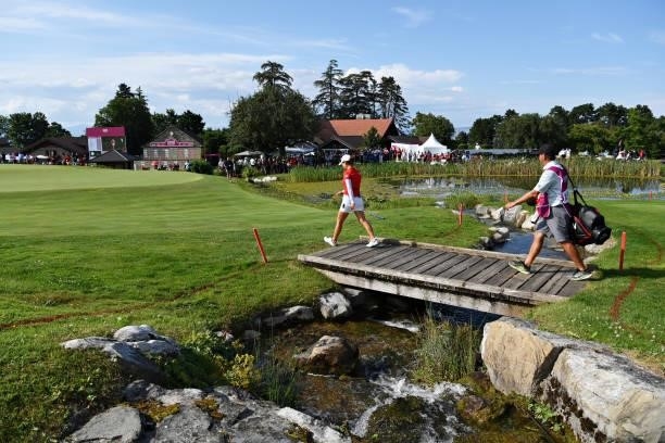 Minjee Lee of Australia walks over a bridge onto the eighteenth green during day four of the The Amundi Evian Championship at Evian Resort Golf Club...