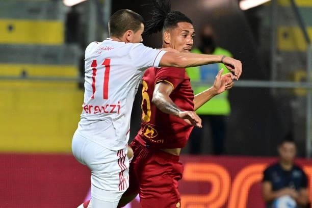 Roma player Chris Smalling compete with Janos Ferenczi during a Friendly match between AS Roma v Debreceni at Benito Stirpe Stadium in Frosinone