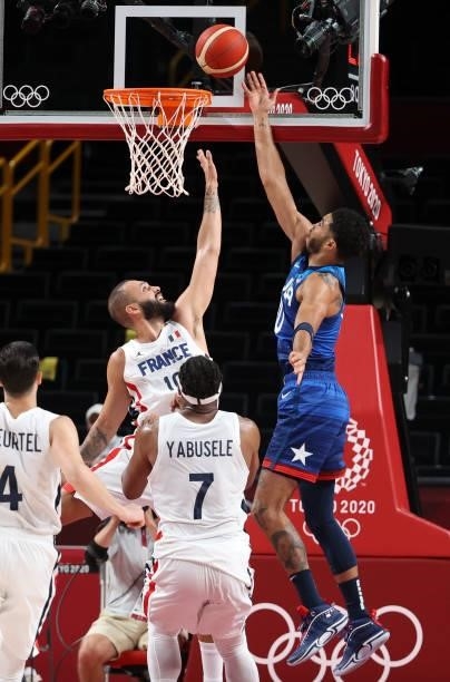 Evan Fournier of France, Jayson Tatum of USA during the Men's Preliminary Round Group B basketball game between United States and France on day two...