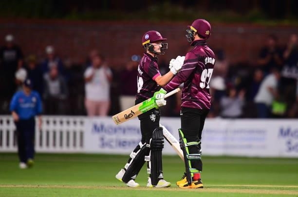 Eddie Byrom and Lewis Goldsworthy of Somerset interact following the Royal London One Day Cup match between Somerset and Derbyshire at The Cooper...
