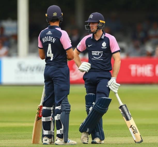 Robbie White of Middlesex interacts with Max Holden of Middlesex during the Royal London Cup match between Essex and Middlesex at Cloudfm County...