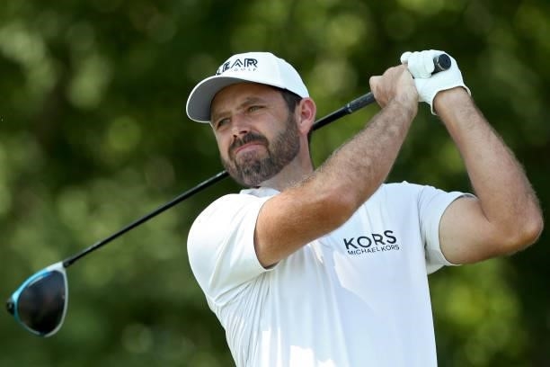 Charl Schwartzel of South Africa plays his shot from the 11th tee during the final round of the 3M Open at TPC Twin Cities on July 25, 2021 in...