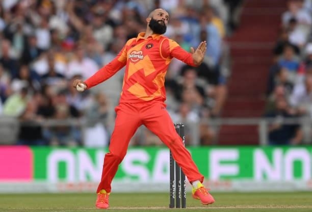 Phoenix bowler Moeen Ali in action during the Hundred match between Manchester Originals and Birmingham Phoenix at Emirates Old Trafford on July 25,...