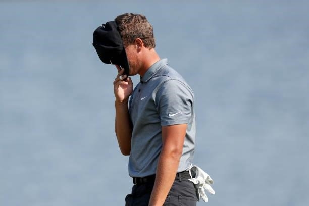 Cameron Champ reacts after making par on the 18th green to finish his round during the final round of the 3M Open at TPC Twin Cities on July 25, 2021...