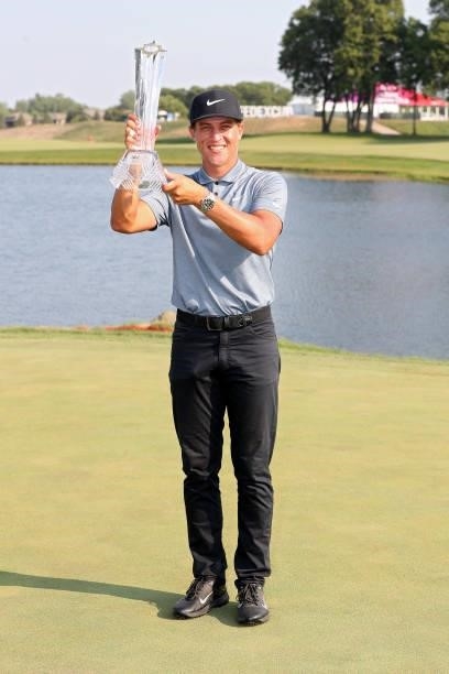 Cameron Champ poses with the trophy after winning the 3M Open at TPC Twin Cities on July 25, 2021 in Blaine, Minnesota.