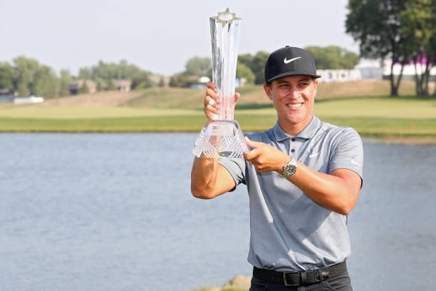 Cameron Champ poses with the trophy after winning the 3M Open at TPC Twin Cities on July 25, 2021 in Blaine, Minnesota.