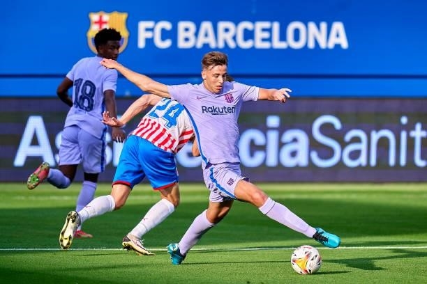 Nico Gonzalez of FC Barcelona in action during a friendly match between FC Barcelona and Girona FC at Estadi Johan Cruyff on July 24, 2021 in...