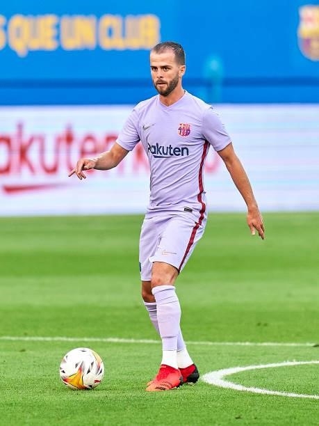 Miralem Pjanic of FC Barcelona with the ball during a friendly match between FC Barcelona and Girona FC at Estadi Johan Cruyff on July 24, 2021 in...