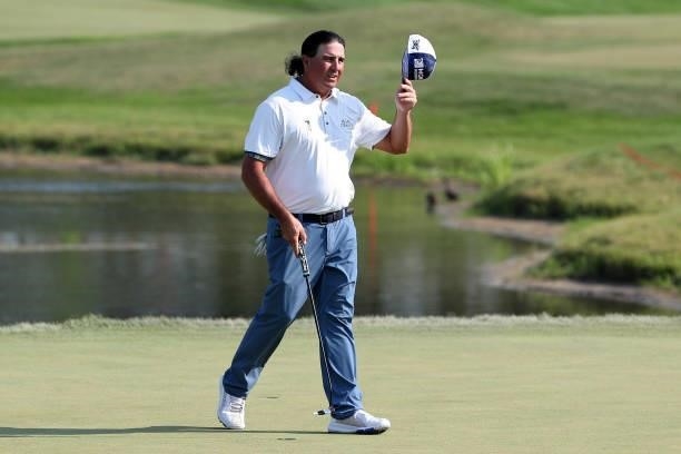 Pat Perez waves to the crowd on the 18th green after his round during the final round of the 3M Open at TPC Twin Cities on July 25, 2021 in Blaine,...