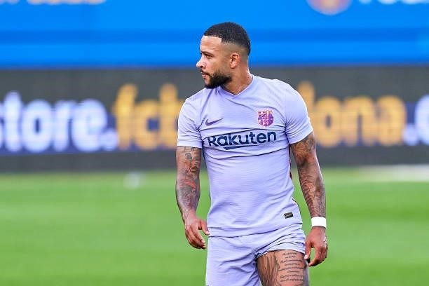 Memphis Depay of FC Barcelona looks on during a friendly match between FC Barcelona and Girona FC at Estadi Johan Cruyff on July 24, 2021 in...