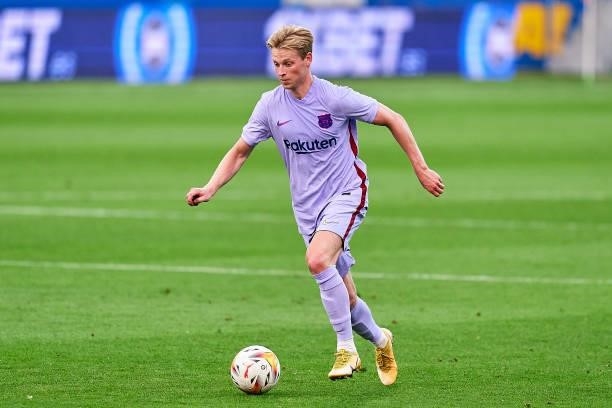 Frenkie De Jong of FC Barcelona with the ball during a friendly match between FC Barcelona and Girona FC at Estadi Johan Cruyff on July 24, 2021 in...