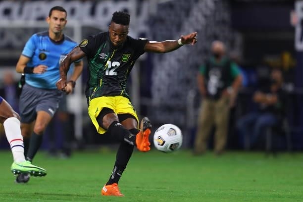 Junior Flemmings of Jamaica kicks the ball during to the a quarterfinal match between United States and Jamaica as part of 2021 CONCACAF Gold Cup at...