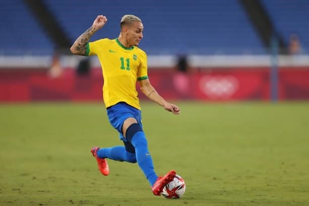 Antony of Team Brazil runs with the ball during the Men's First Round Group D match on day two of the Tokyo 2020 Olympic Games at International...