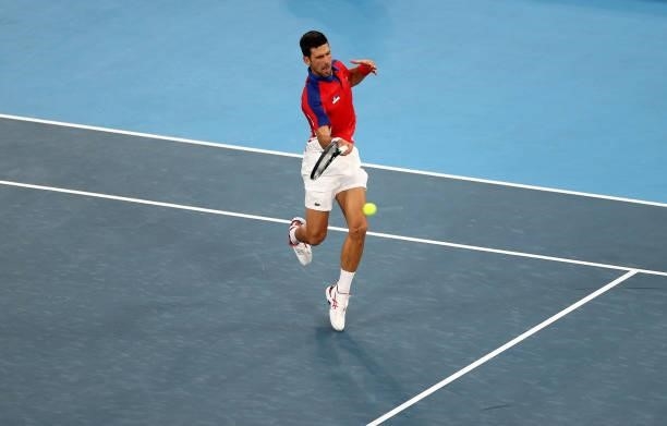 Novak Djokovic of Team Serbia plays a forehand during his Men's Singles Second Round match against Jan-Lennard Struff of Team Germany on day three of...