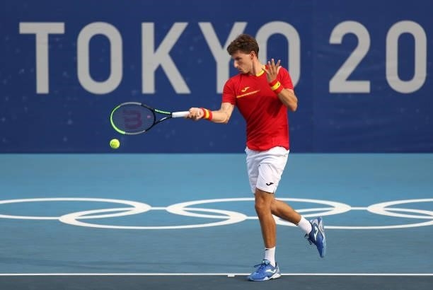Pablo Carreno Busta of Team Spain plays a forehand during his Men's Singles Second Round match against Marin Cilic of Team Croatia on day three of...