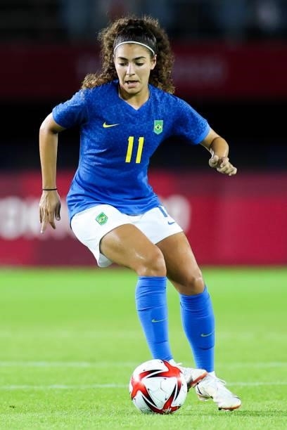 Angelina of Brazil controls the ball during the Women's First Round Group F match on day one of the Tokyo 2020 Olympic Games at Miyagi Stadium on...